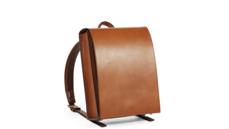 通过制造书包培养的技术,被凝聚于成人背包。